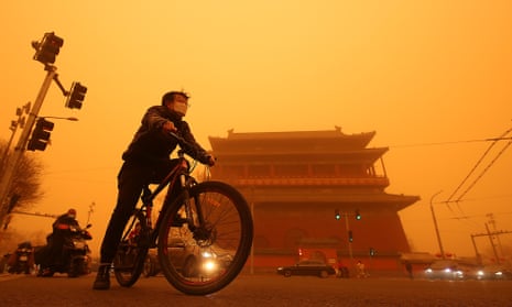 A heavy sandstorm in Beijing in March. Solving the problem of climate change is a priority for China and the US but it could still spark confrontation. 