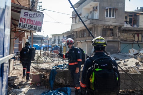 Bravo Team leader Scott Hanley (middle) directs the Australian Disaster Assistance Response Team through the streets of Antakya