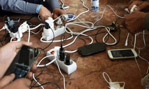 People charging mobile phones in Hungary