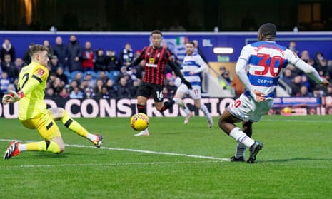 Queens Park Rangers' Sinclair Armstrong (right) opens the scoring against Bournemouth.