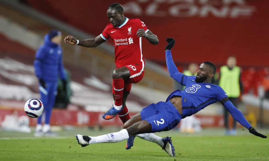 Antonio Rüdiger tackles Liverpool’s Sadio Mané at Anfield. The Chelsea defender has impressed since returning to the team.