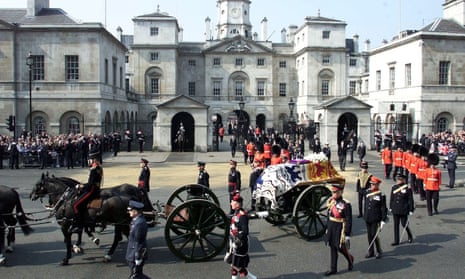 The coffin of Queen Elizabeth, the Queen Mother, passes into Whitehall from Horse Guards in 2002.