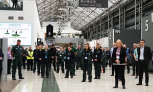 NHS staff observe a minute’s silence in honour of key workers who have lost their lives due to COVID-19 at Louisa Jordan hospital in Glasgow.