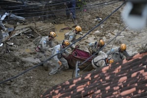 Rescue workers with body