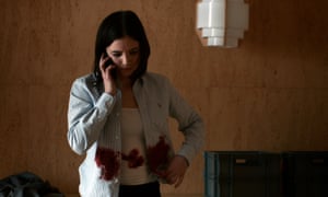 Elin, our heroine, covered in blood.