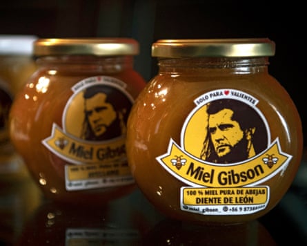 Jars of Miel Gibson honey with a still from Braveheart on the label
