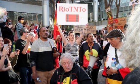 Protesters at a rally outside the Rio Tinto office in Perth on Tuesday.