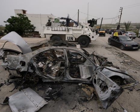 The UN Interim Force in Lebanon patrols as people make their way home near Qasmiyeh