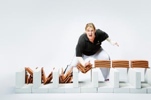 Lisa Dennis cracking tiles with her hand