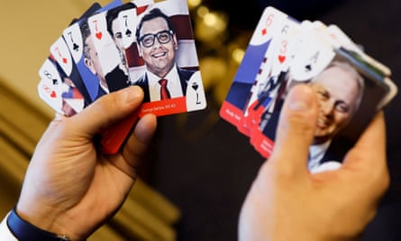 Representative George Santos displays a deck of cards depicting Republican House leaders and freshmen members; Santos, the seven of spades, is the only household name among Indivisible’s 18 targets.