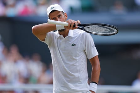 Novak Djokovic of Serbia reacts during his men's singles semi-final against Jannik Sinner of Italy.