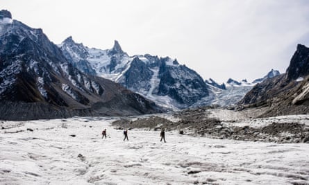 Hikers on the Mer de Glace glacier, the largest glacier of the Mont Blanc massif in the French Alps.