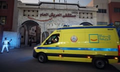 An ambulance carrying an injured evacuee from Gaza enters a hospital after crossing the Rafah border.