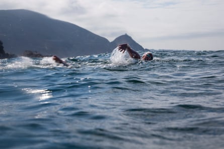 A woman swimming in the open ocean.