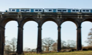 A Thameslink train crosses a viaduct