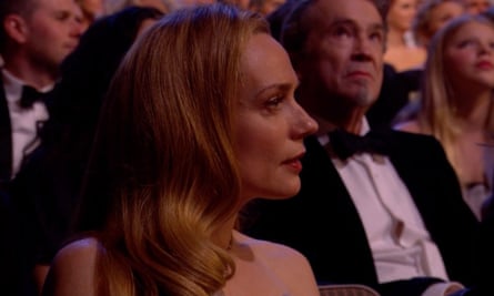 Kerry Condon looks on.