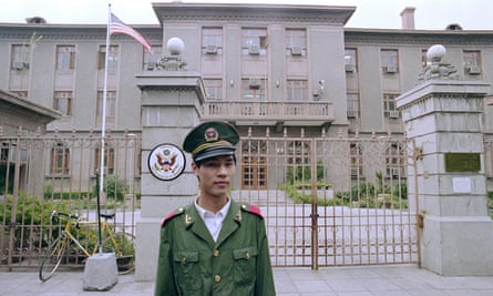 A policeman guards the US embassy in Beijing on 13 June 1989, while dissident Fang Lizhi was taking shelter there