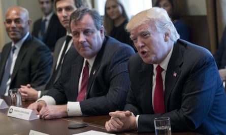 Chris Christie sits next to Donald Trump in a White House briefing about the opioid crisis, as Jared Kushner, second left, watches on.