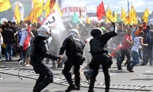 Protesters clash with police during the protest in Brasilia on Wednesday.