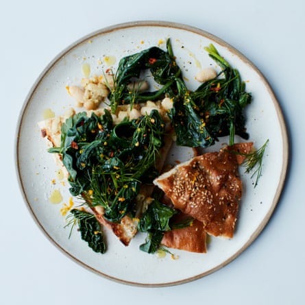 The speedy supper: Anna Jones’s herby cannellini on toast topped with spring greens.