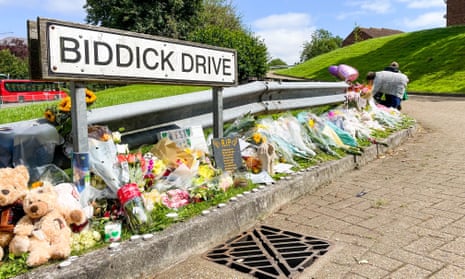 Flowers placed at the scene of the shootings in Plymouth