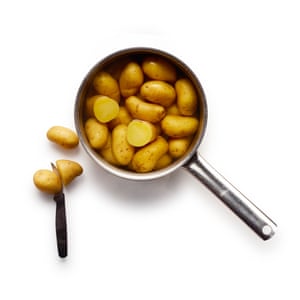 Boil waxy potatoes until they’re tender but not quite cooked through, then drain and steam dry.