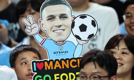 Korean fans display a Phil Foden cutout during Manchester City’s preseason tour.  