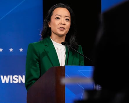 Francesca Hong speaking on stage at a lectern