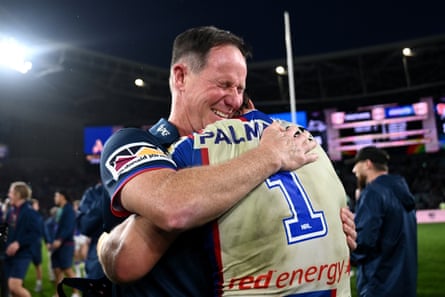 Justin Holbrook and Kalyn Ponga hug