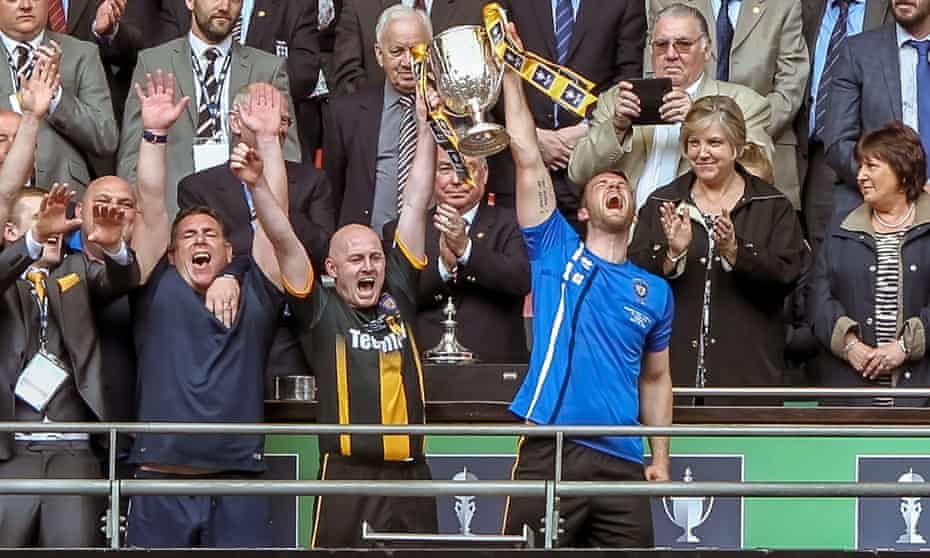 Morpeth Town lift the FA Vase after beating Hereford FC 4-1 in the final at Wembley.