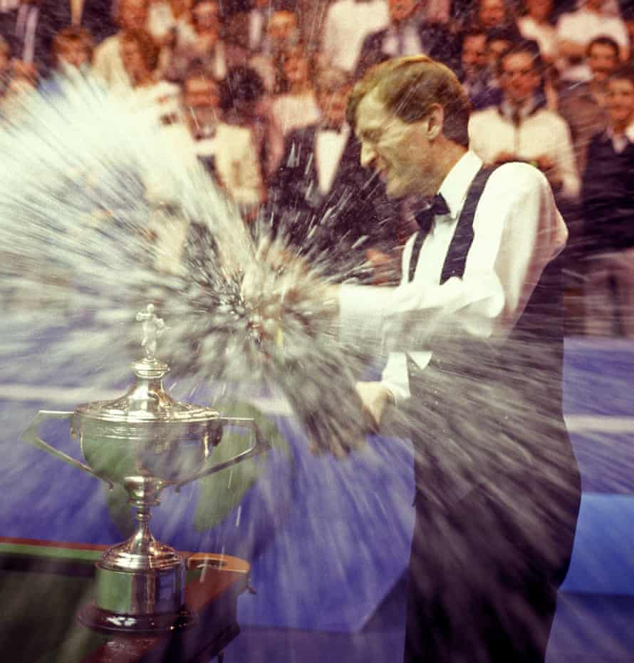 Steve Davis cracks open the champagne at the Crucible.