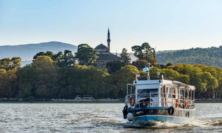 Ferry boat on Lake Pamvotis with the Ali Pasha Mosque in the background.