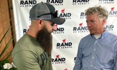 Rand Paul, right, greets a man attending a campaign rally in Smithfield, Kentucky.
