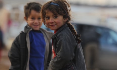 Children play in a refugee camp in Syria.