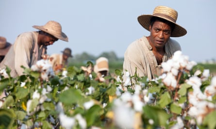 Chiwetel Ejiofor picks cotton in the 2013 film 12 Years a Slave.