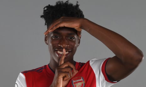 Albert Sambi Lokonga strikes a pose during his Arsenal unveiling at at London Colney.