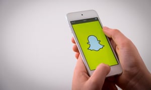 A boy using Snapchat