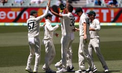 Australia celebrates after a catch by captain Tim Paine during the first Test against India in Adelaide on 19 December.