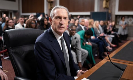 Longtime Starbucks CEO Howard Schultz arrives at a crowded Senate Health, Education, Labor and Pensions Committee hearing room where he expects to face sharp questioning about the company's actions during an ongoing unionizing campaign, at the Capitol in Washington, Wednesday, March 29, 2023.