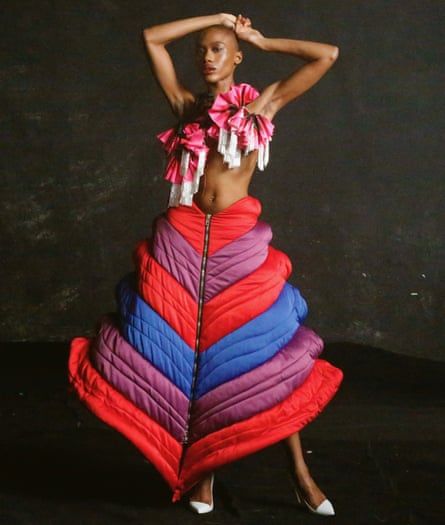 Model in a red, purple and blue skirt, designed by Charles de Vilmorin