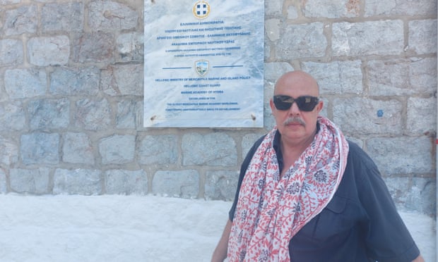   Dimitrios Antonitsis in front of the building on Hydra where his latest summer show of international artists is being held.