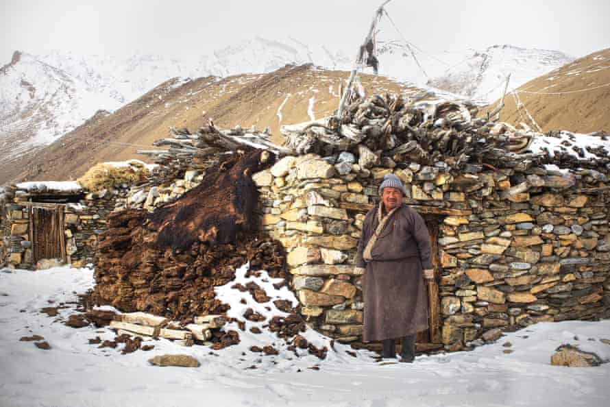 A herder stands proudly in front of his winter house in Dat. The yak skin will be dried out and the hair used to make a tent to live in during spring/summer in the Zara Valley.