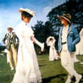 Julie Christie in The Go-Between. Stands in a white dress on a lawn in the sun.