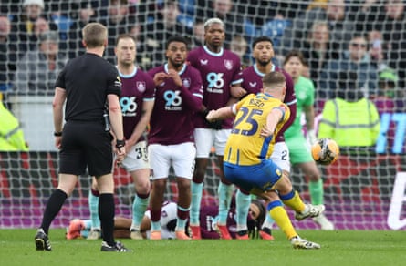 Louis Reed scores Mansfield’s winning goal past the Burnley wall