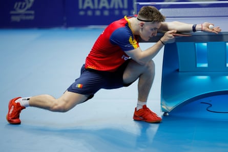 Iulian Chrita of Romania prepares to serve. He defeated Farouk Salifou of Benin