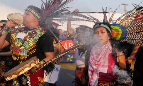 In a protest peppered with traditional drumming, smoke ceremonies and dancing, Indigenous people from the Brazilian Amazon and Guatemalan highlands marched alongside Cameroonian grassroots activists and peasant leaders from Pakistan