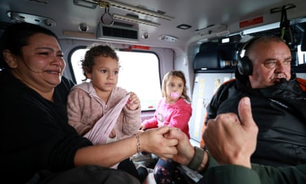 A family in helicopter rescued by fire crews