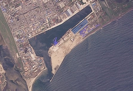 A satellite image shows the North Korean warship in the water at shipyard after the launch accident, in Chongjin