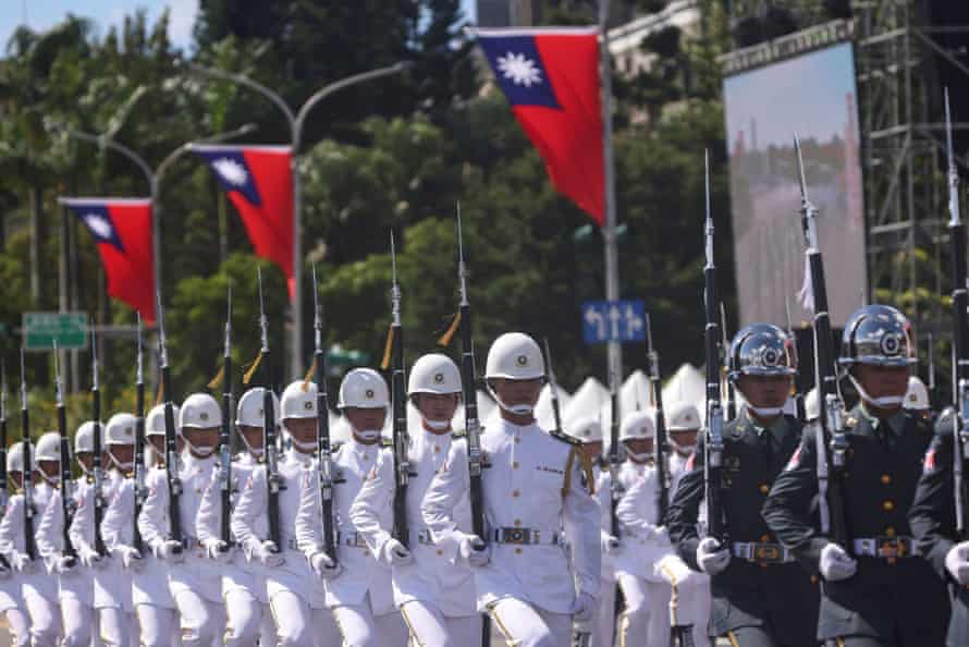 Soldiers march during the national day celebration.