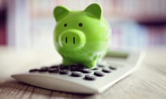 Green piggy bank with calculator.